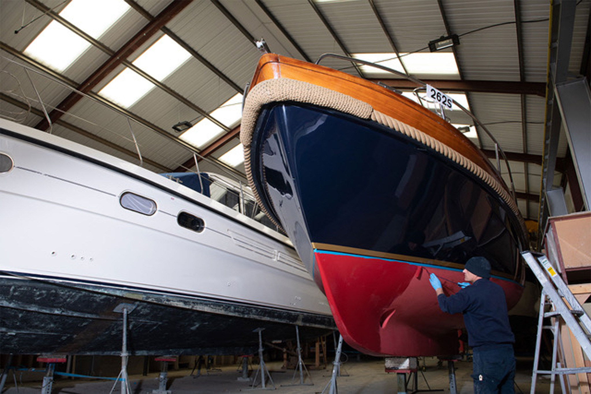 Clean ship hull maintained with antifouling paint in marine conditions